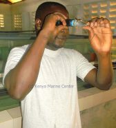 kenya-marine-center-employee-checking-the-waters-salinity